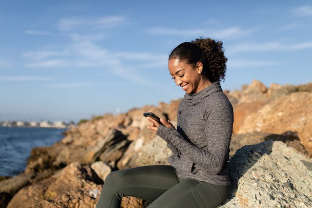 woman scrolling her phone